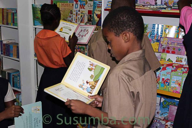 Students browsing the books at Bookland New Kingston